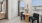 a living room with a table and chairs